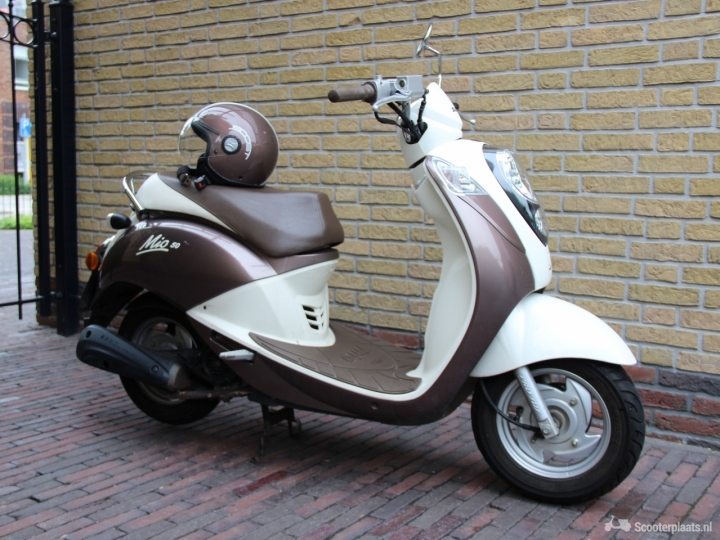 Sym Mio bruin