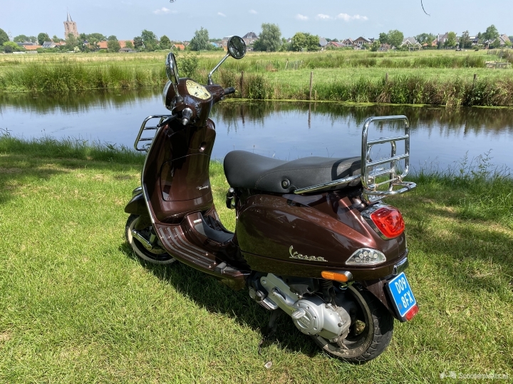 Vespa LX 50 Touring bruin