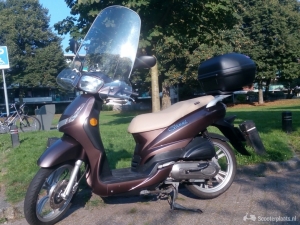 Met hangalarm en helmet rijdt 60km