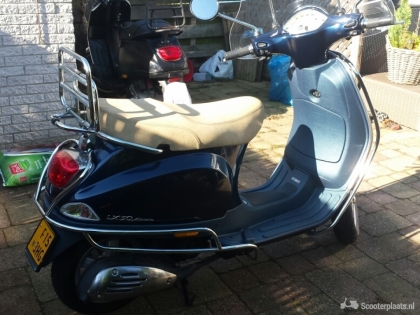 Mooie Vespa LX50 4TACT - Scooterplaats