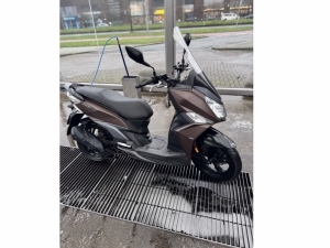 Sym Jet bruin